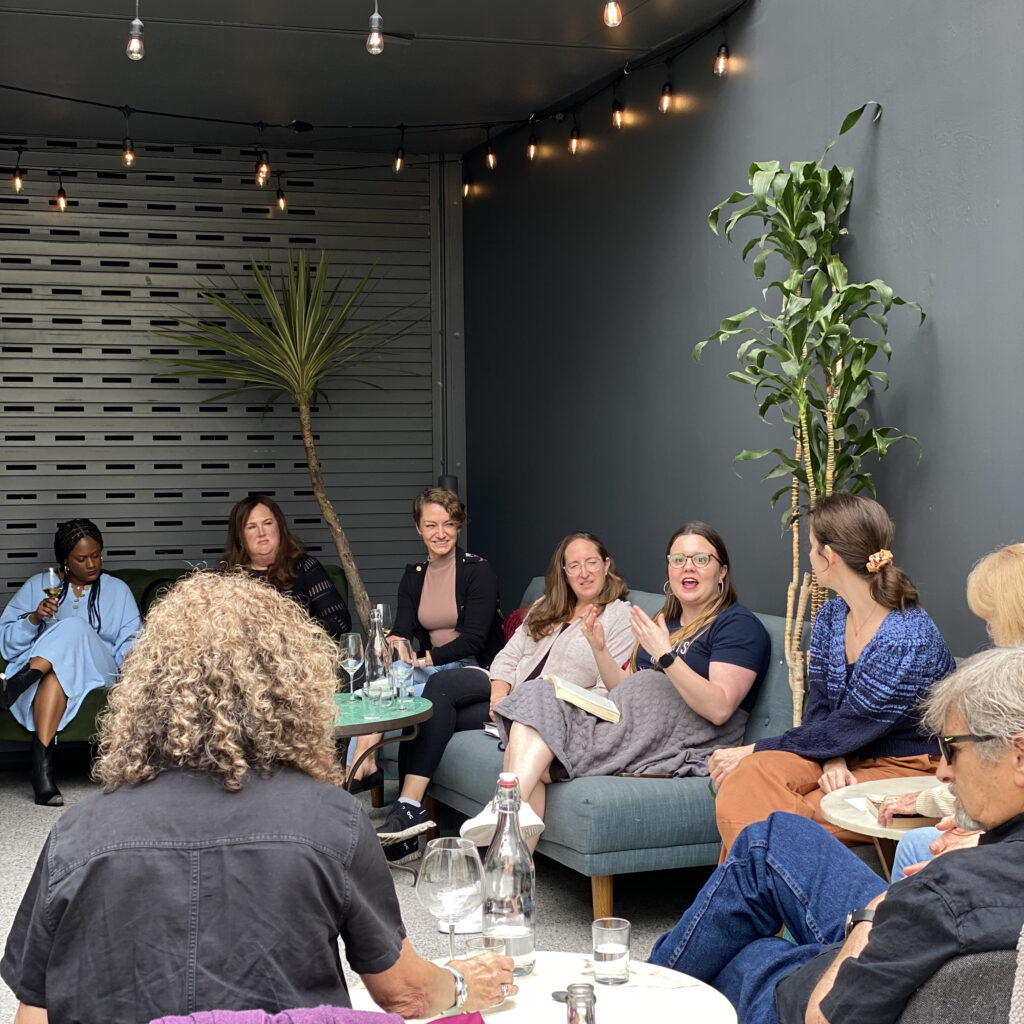 guests gathered in a circle on our outdoor patio